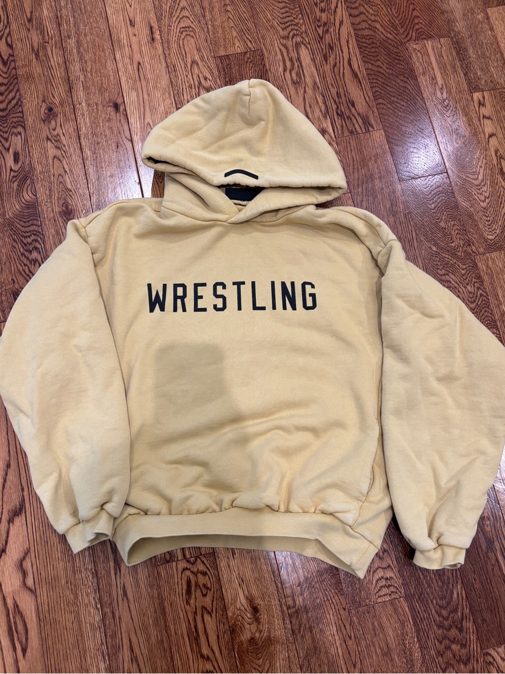 Essentials Fear of God Boy’s Crewneck Hoodie in Gold with WRESTLING Print